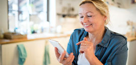 Woman looking at smart phone